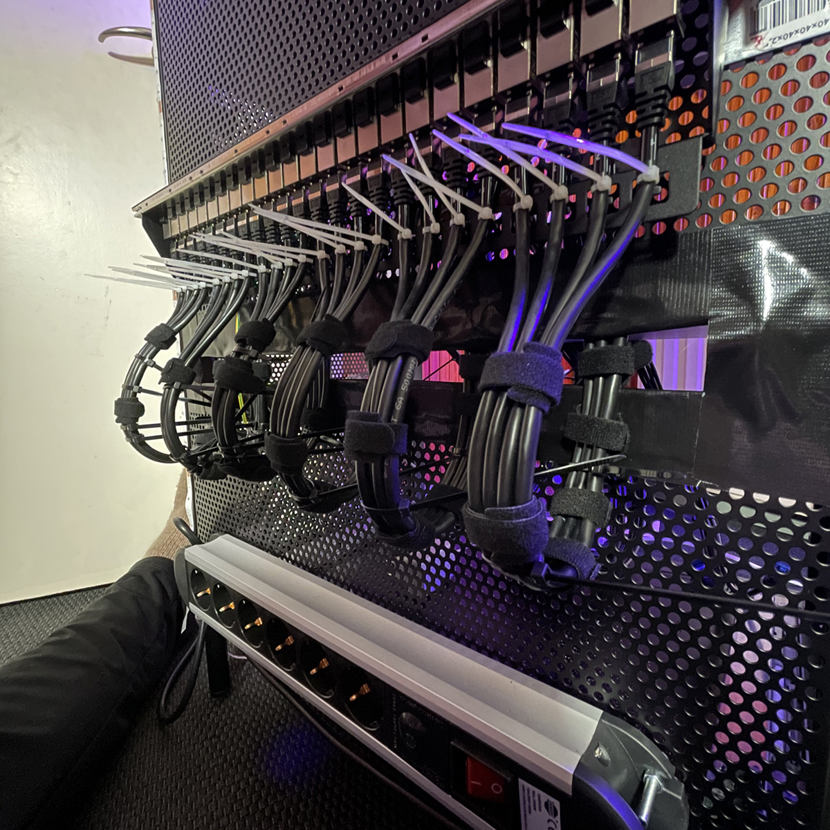 Rack cabinet from behind with cabling